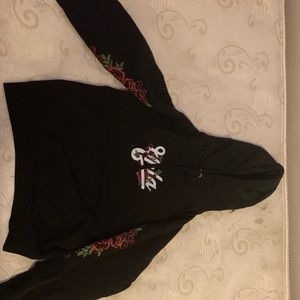 black hoodie with rose details